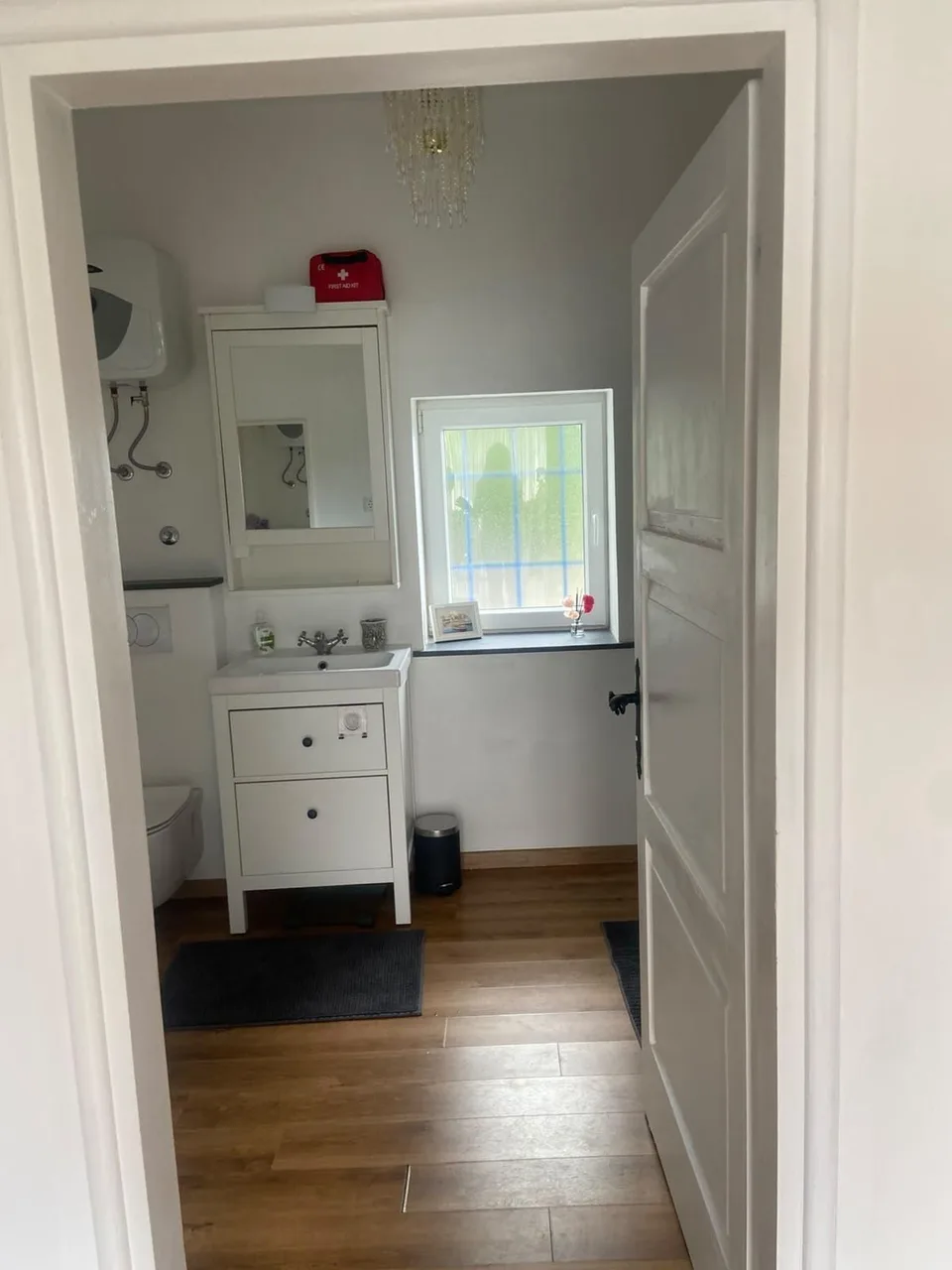 The bathroom seen from the hallway